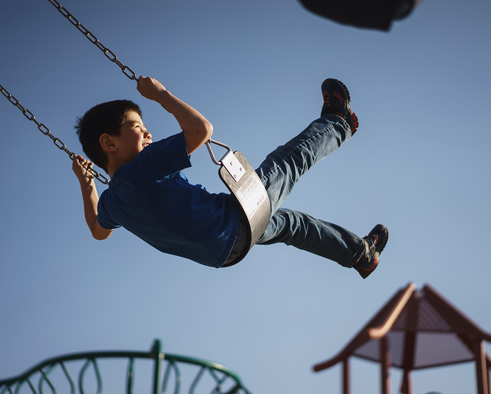 myles-tan-WNAO036c6FM-unsplash Boy swinging